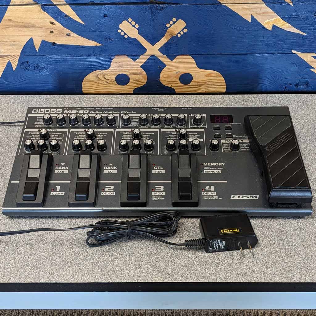 Used Boss ME-80 Multi Effects Processor Boss Effects Pedal This effects  processor features delay, reverb, modulation, and EQ, a knob-based  interface for ease of use. It can run off either six AA