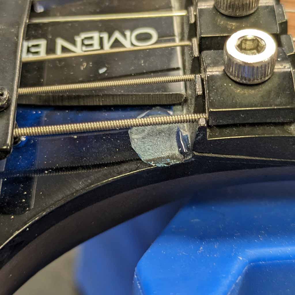 Used Shecter Omen Elite 6 Floyd Rose Electric Guitar View of Chip