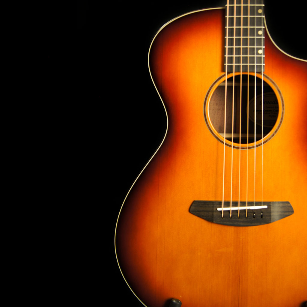 Breedlove Premier Concert Cutaway w/Solid Port Orford Cedar Top and Solid Walnut Back and Sides in Cognac Burst